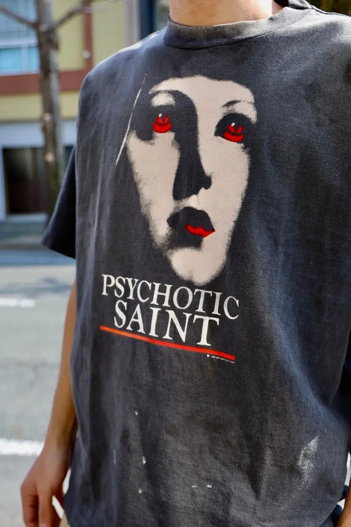 SAINT Mxxxxxx SS TEE/PSYCHOTIC SNT/BLK Gothic heavy metal rock style retro short-sleeved Mysterious woman's face printed distressed TEE Washed black S-XL Same as the original version Cylindrical side seam OE yarn fabric Garment dyeing Faded by heavy washing Bust plaster faded Correct version Matching of original accessories